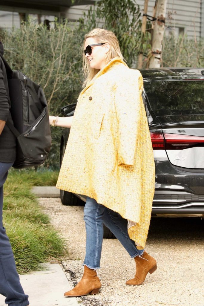 Reese Witherspoon in a Yellow Coat