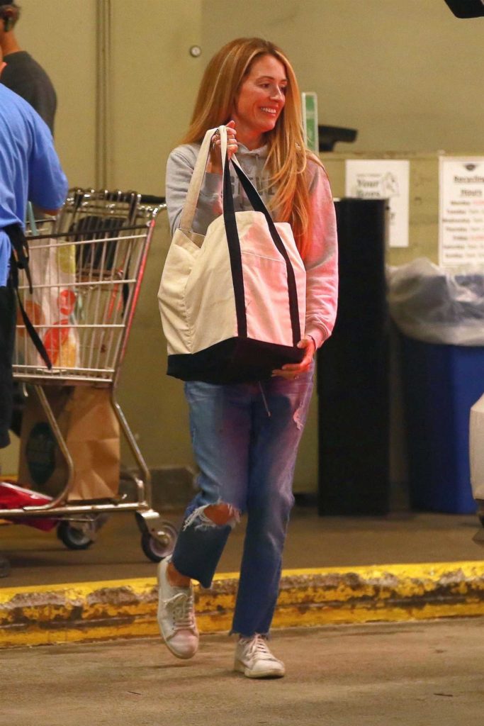 Cat Deeley in a Blue Ripped Jeans