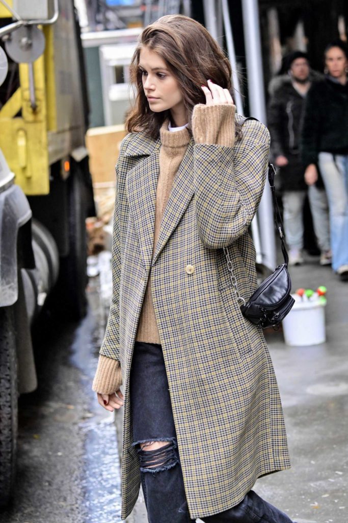Kaia Gerber in a Plaid Trench Coat