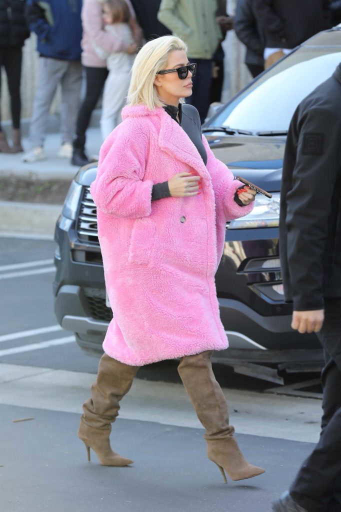 Khloe Kardashian in a Pink Fur Coat