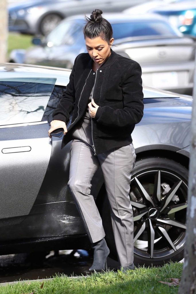 Kourtney Kardashian in a Gray Pants
