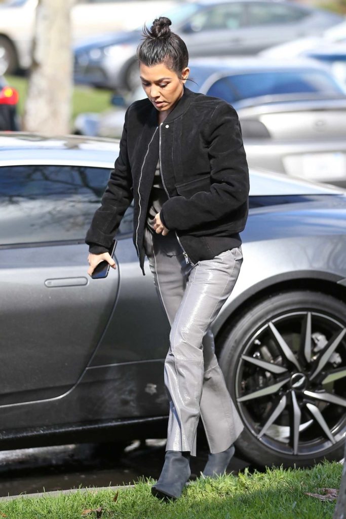 Kourtney Kardashian in a Gray Pants