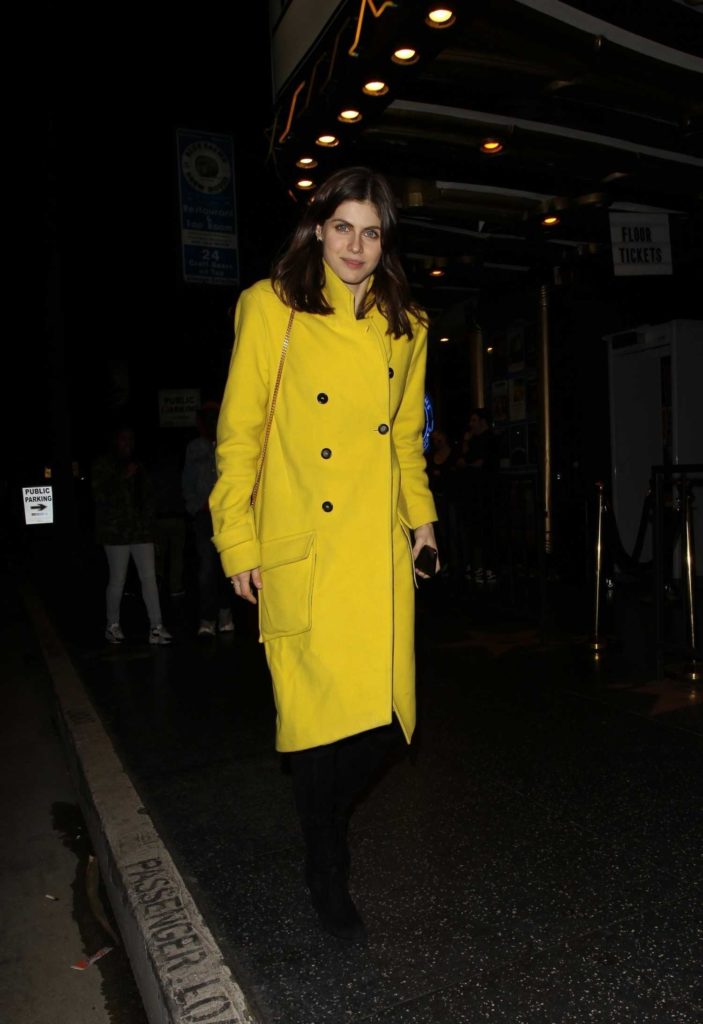 Alexandra Daddario in a Yellow Coat