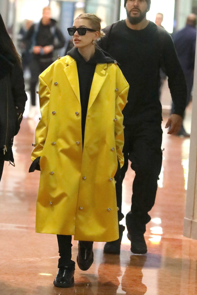Hailey Baldwin in a Yellow Trench Coat