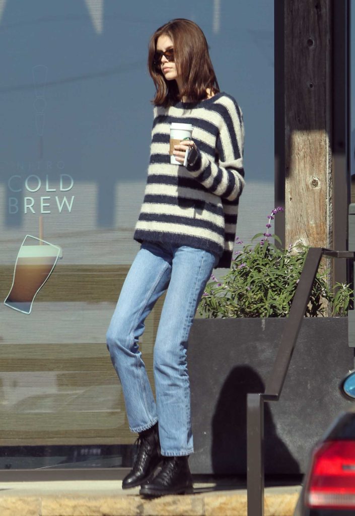 Kaia Gerber in a Striped Sweater