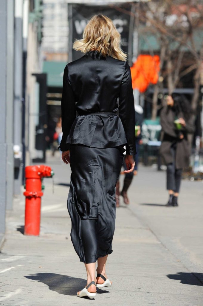 Karlie Kloss in a Black Suit