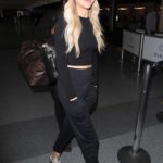 Kelsea Ballerini in a Red Knit Hat Arrives at LAX Airport in Los Angeles