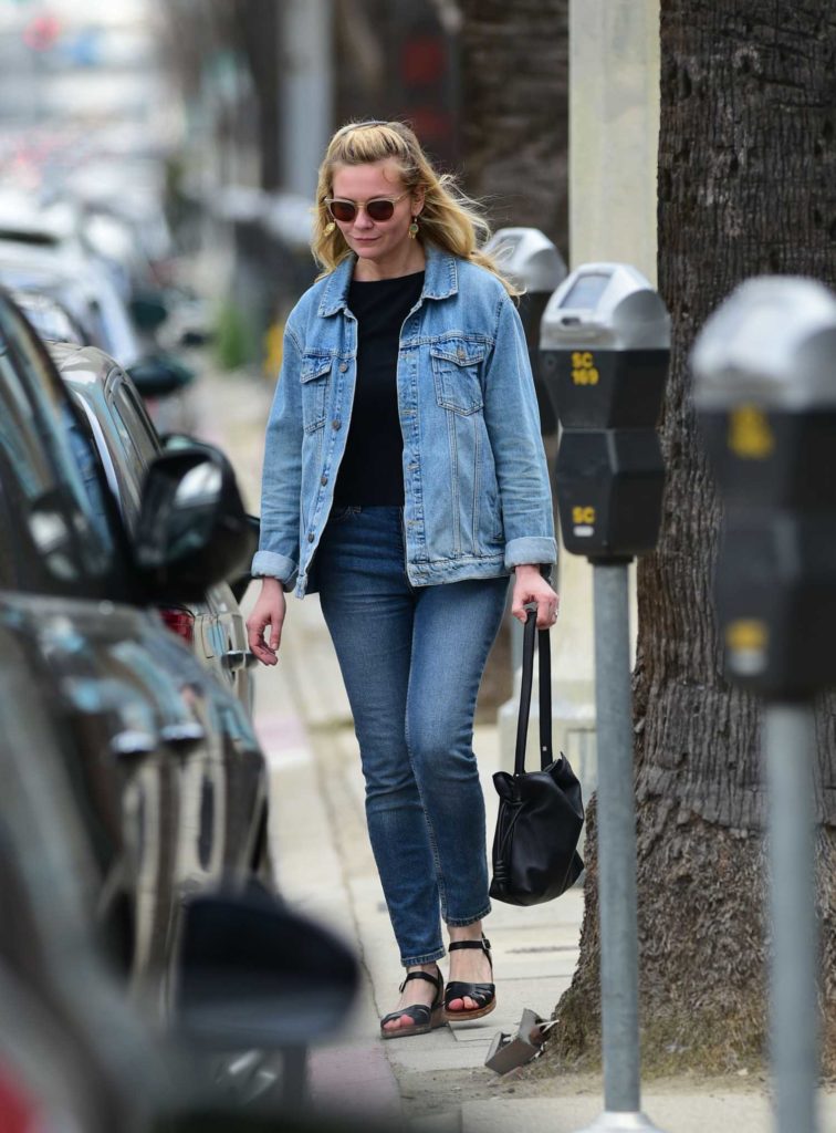Kirsten Dunst in a Blue Denim Jacket