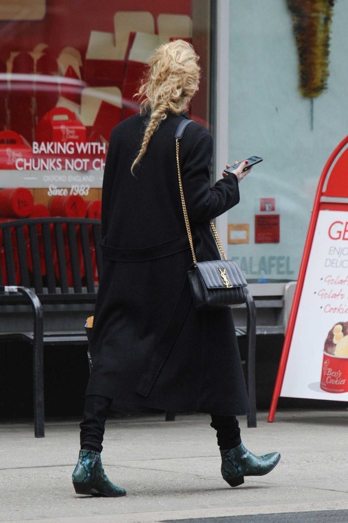 Amber Heard in a Black Coat