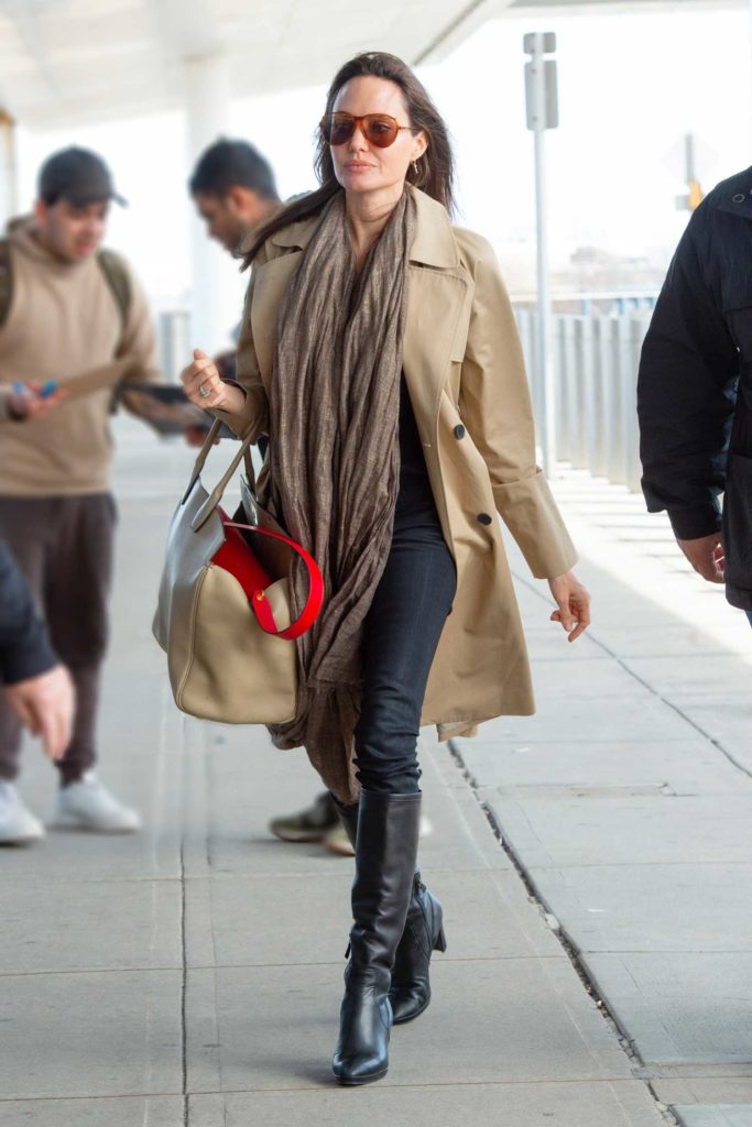 Angelina Jolie in a Beige Trench Coat