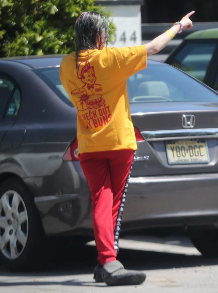 Dani Thorne in an Orange T-Shirt