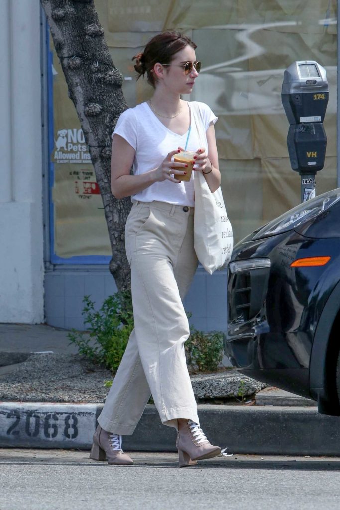 Emma Roberts in a Beige Pants