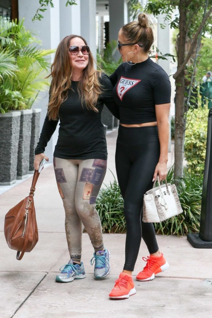 Jennifer Lopez in a Red Nike Sneakers