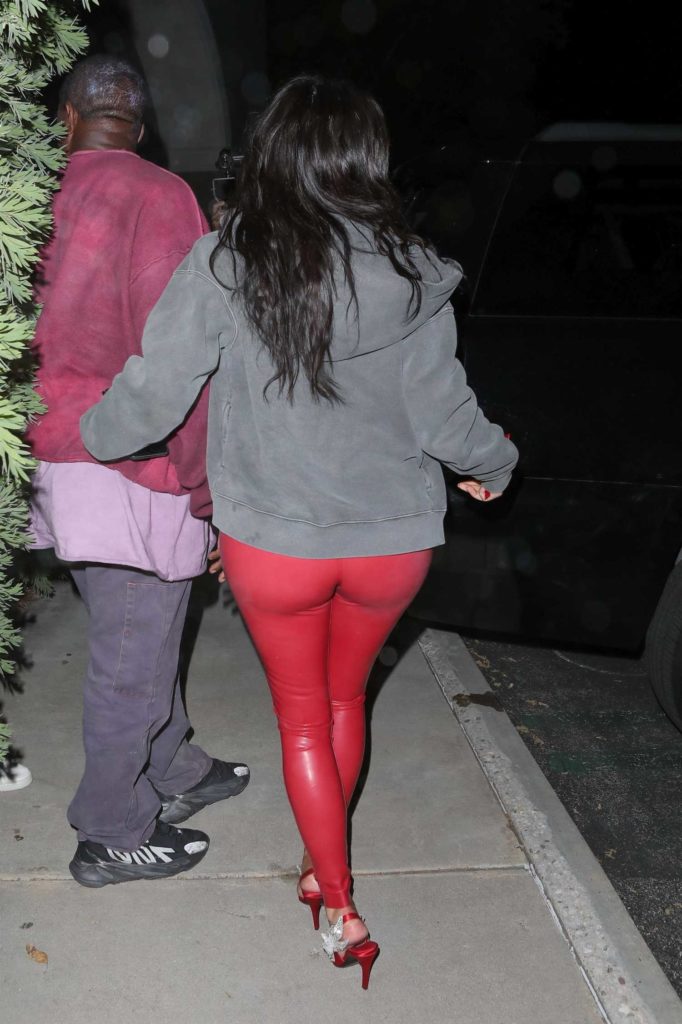 Kim Kardashian in a Red Leggings