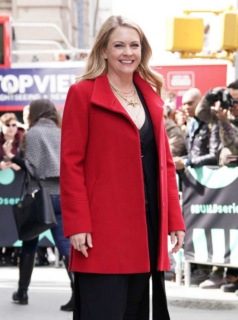 Melissa Joan Hart in a Short Red Coat