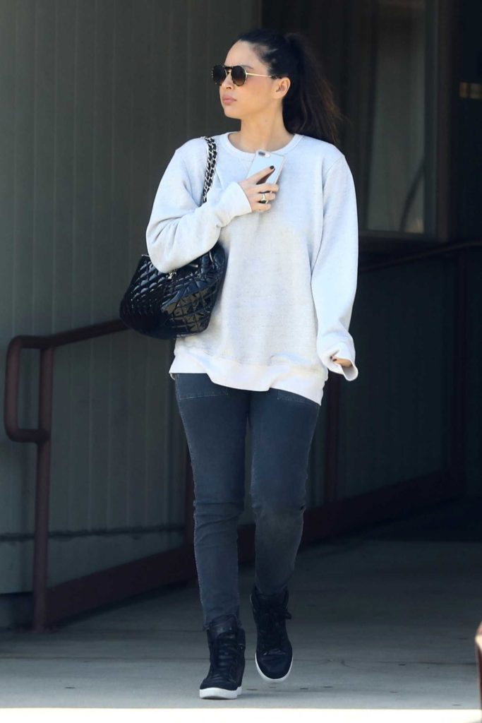 Olivia Munn in a Gray Sweatshirt