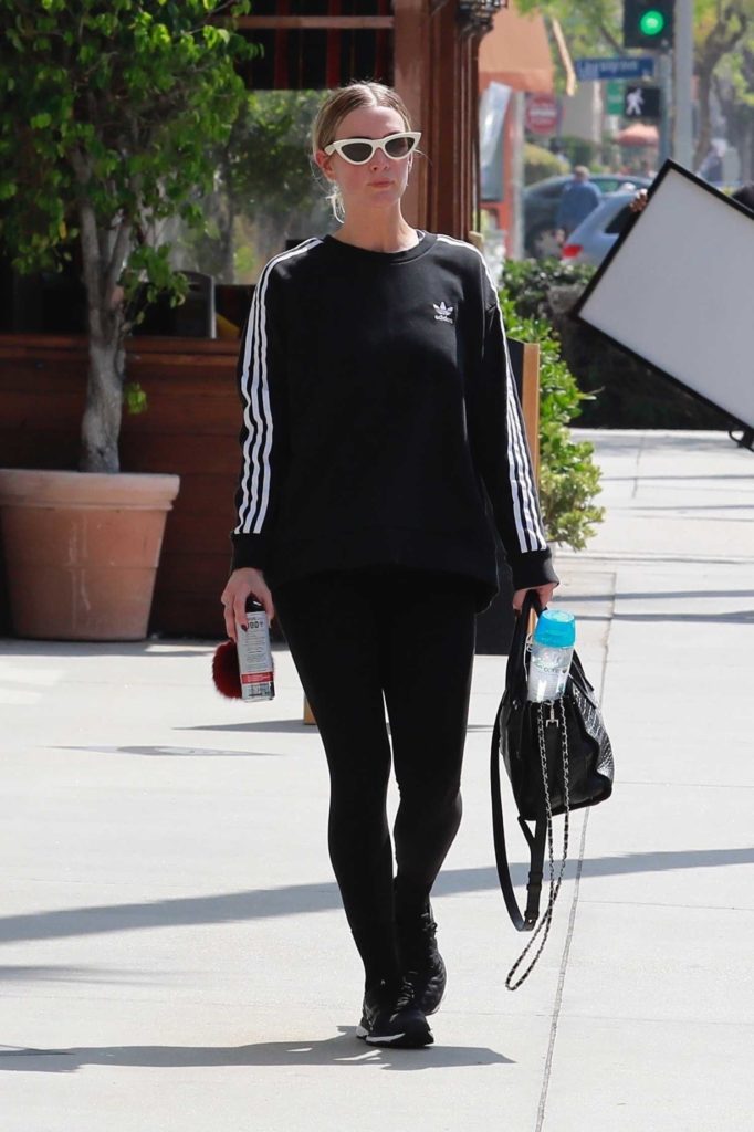 Ashlee Simpson in a Black Adidas Sweatshirt