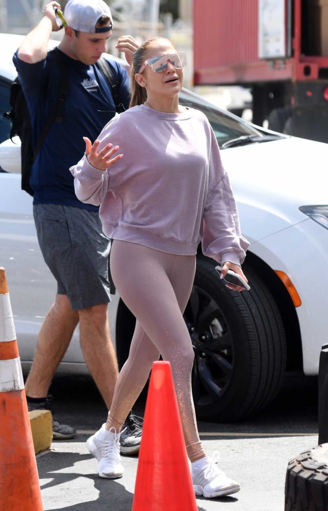 Jennifer Lopez in a Purple Sweatshirt