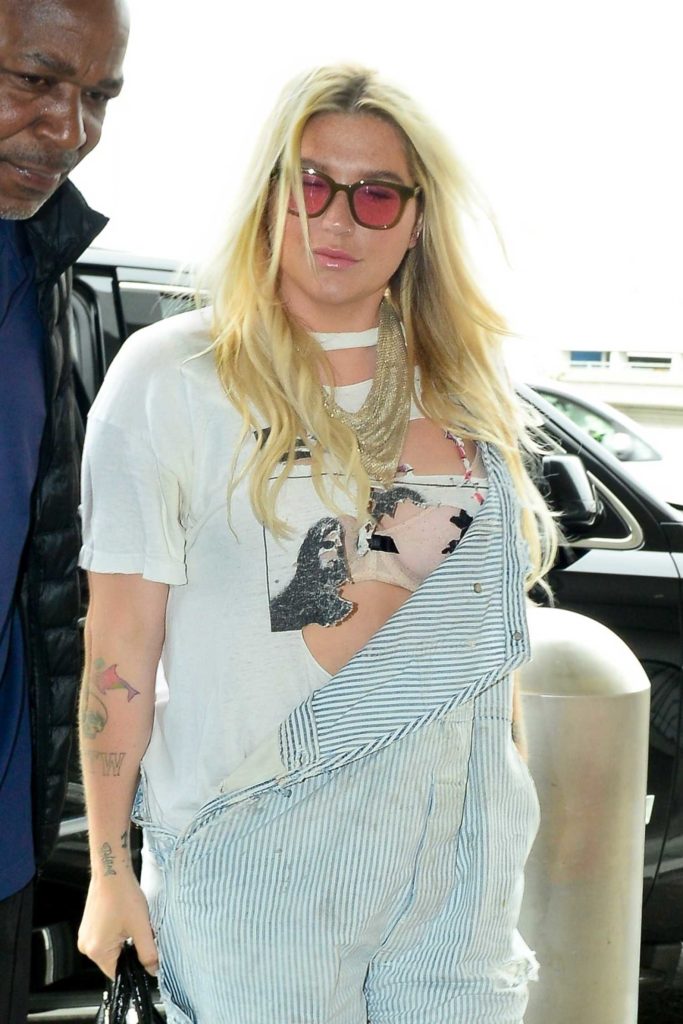 Kesha in a Striped Jumpsuit
