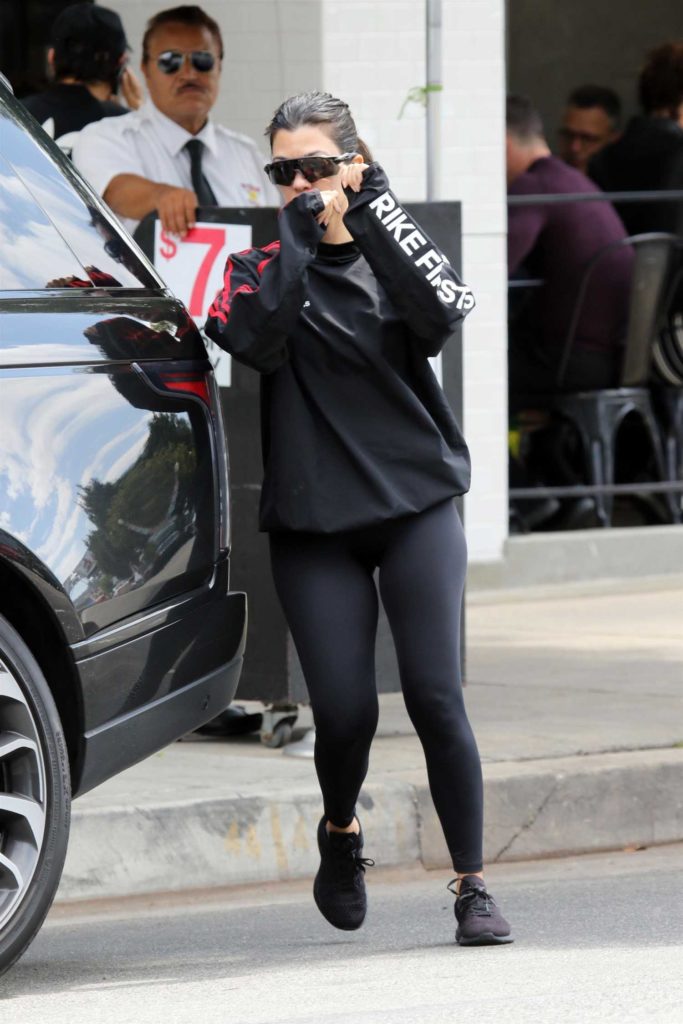 Kourtney Kardashian in a Black Leggings
