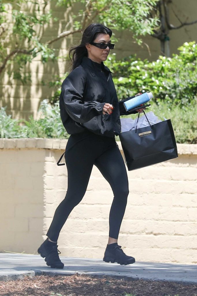 Kourtney Kardashian in a Black Leggings