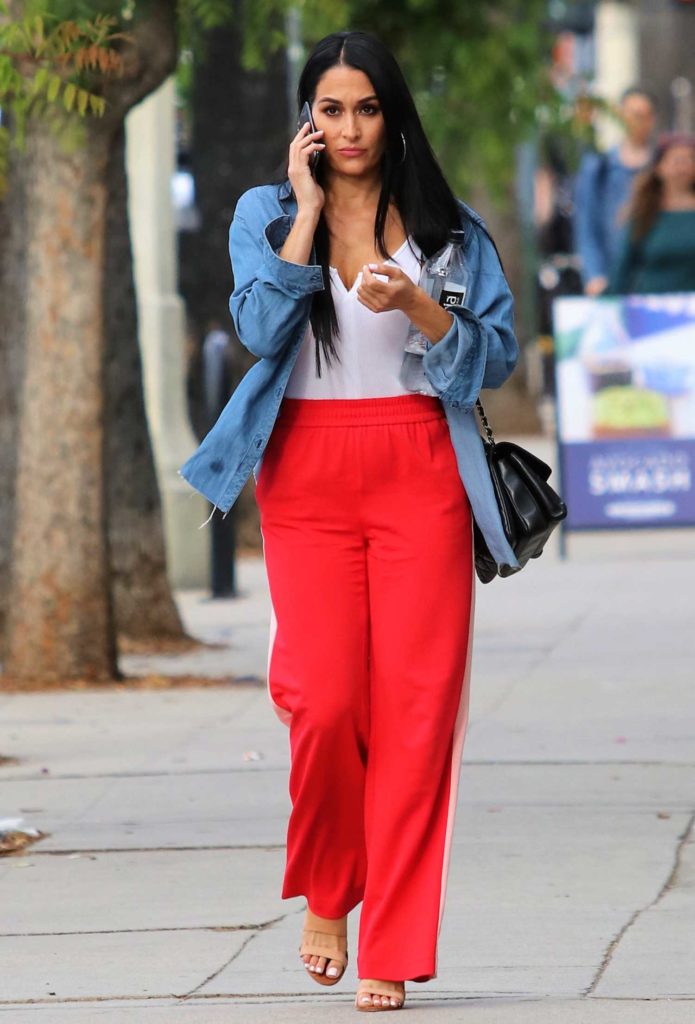 Nikki Bella in a Red Track Pants