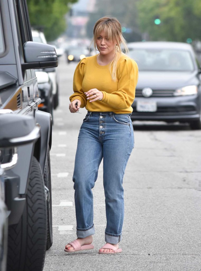 Hilary Duff in a Yellow Blouse