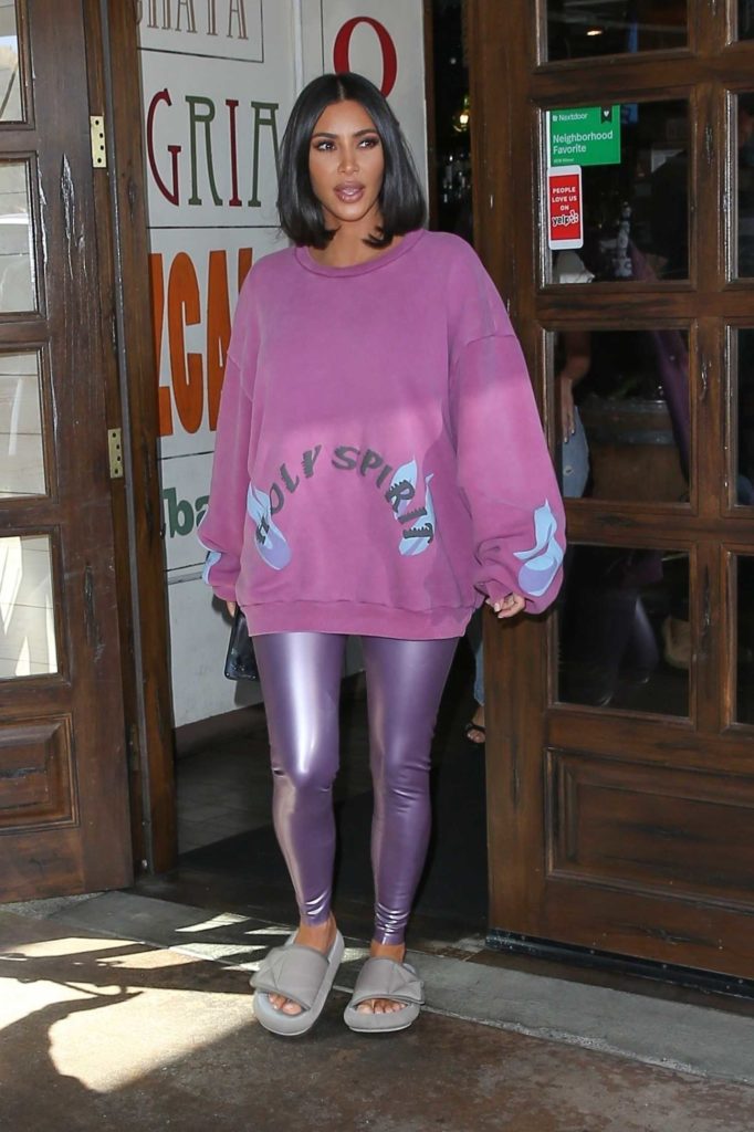 Kim Kardashian in a Purple Oversized Sweatshirt