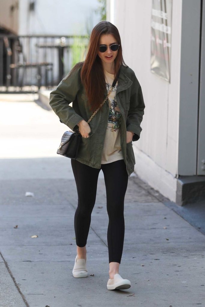 Lily Collins in a Green Jacket