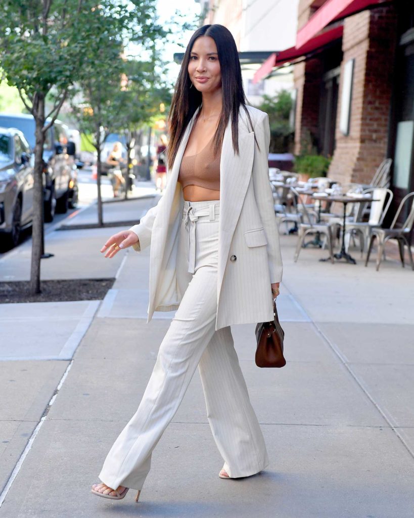 Olivia Munn in a White Striped Suit