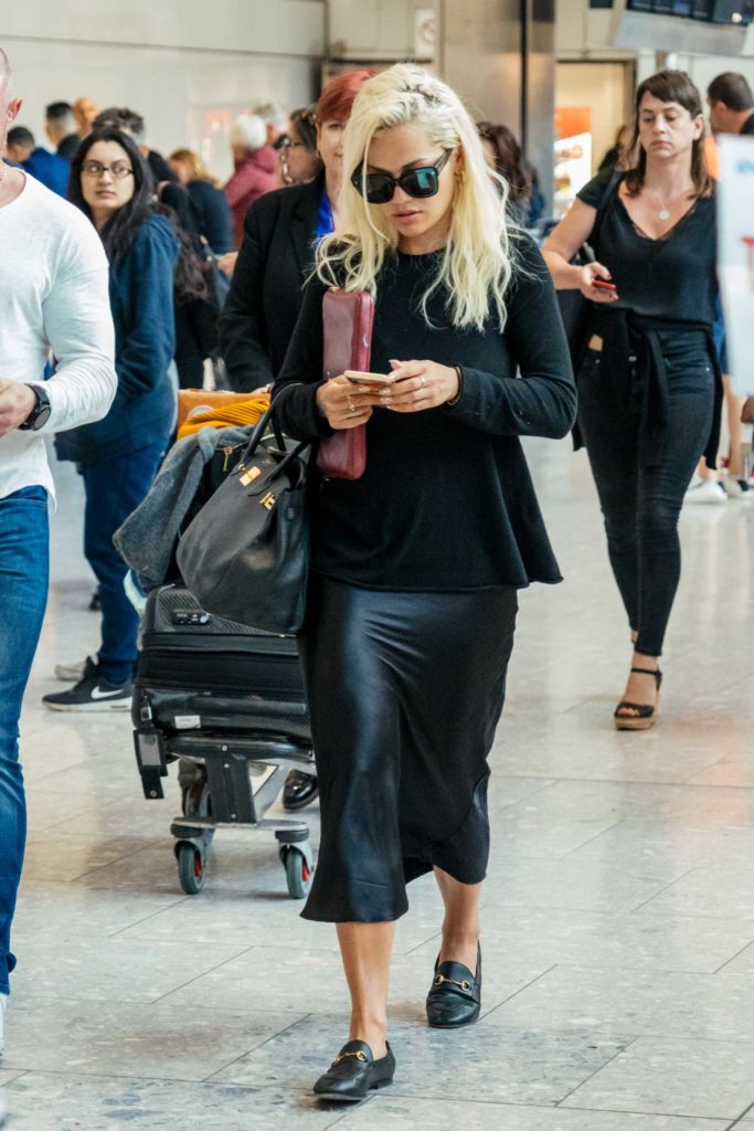 Rita Ora in a Black Sweater