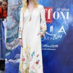 Elle Fanning in a Beige Floral Dress Attends the Giffoni Film Festival in Giffoni Valle Piana, Italy