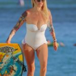 Jenna Jameson in a White Swimsuit on the Beach in Hawaii