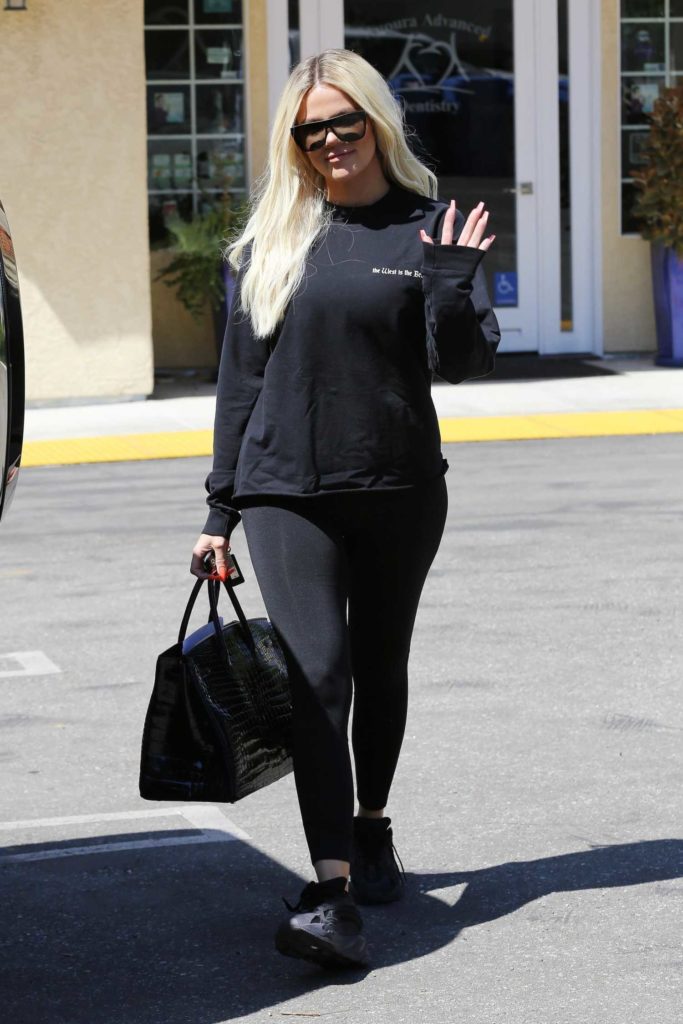 Khloe Kardashian in a Black Leggings