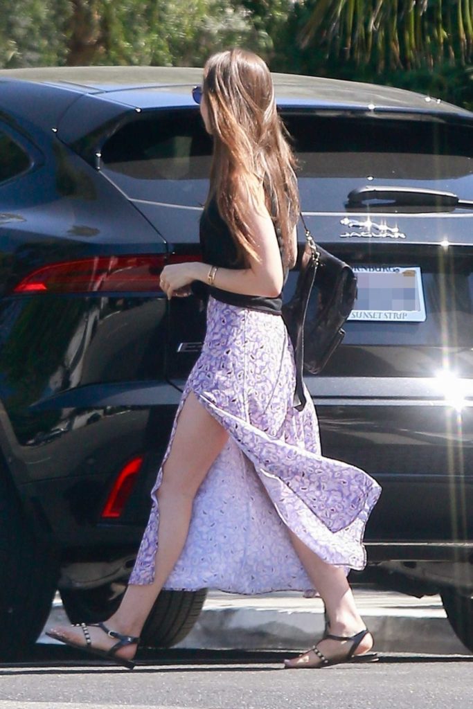Lily Collins in a Purple Floral Skirt