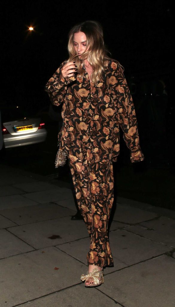 Margot Robbie in a Floral Suit