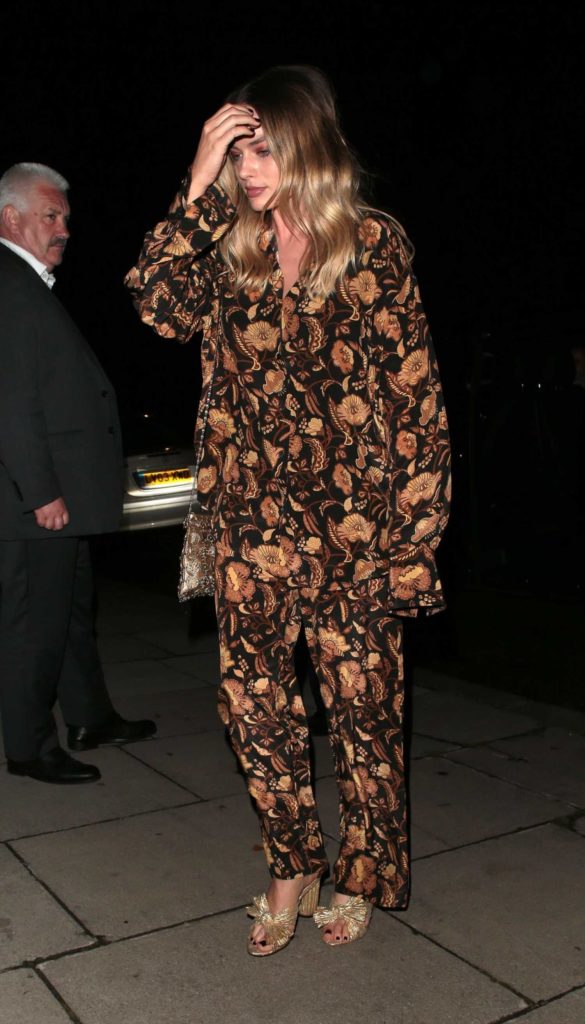 Margot Robbie in a Floral Suit