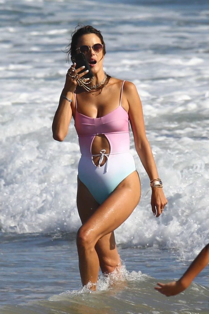 Alessandra Ambrosio in a Purple and Green Swimsuit