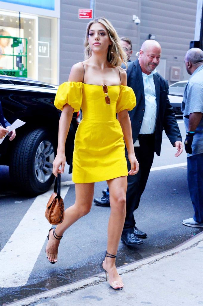 Sistine Stallone in a Yellow Dress