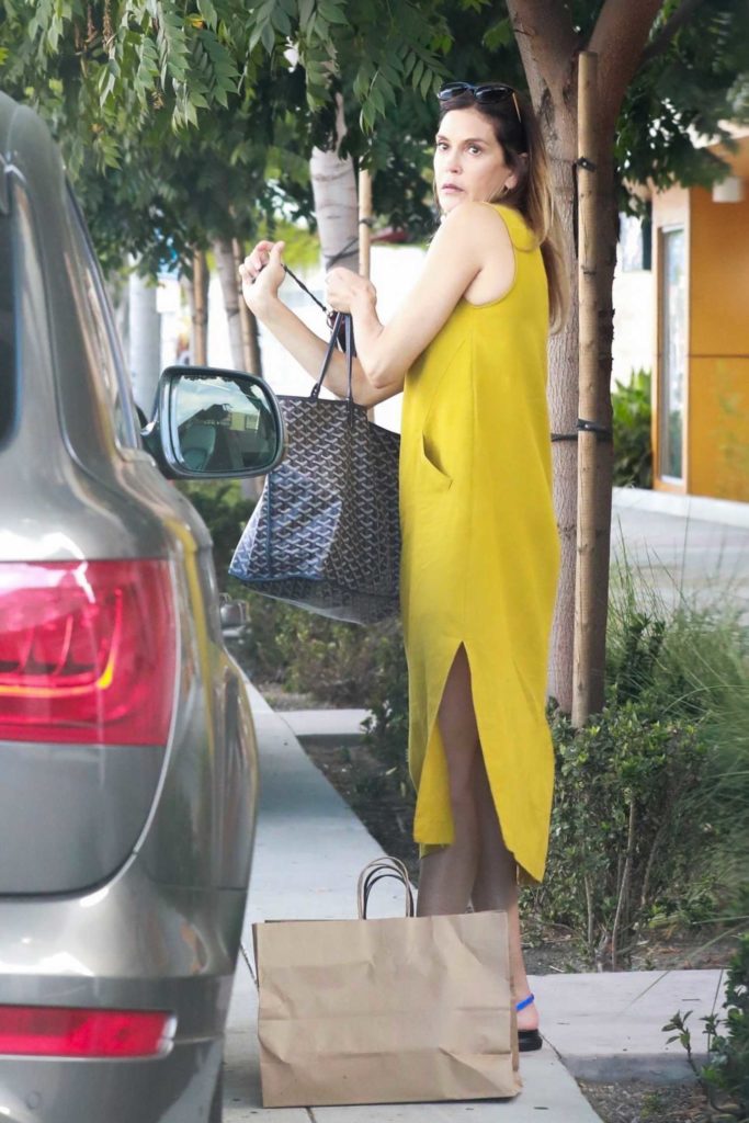 Teri Hatcher in a Yellow Dress