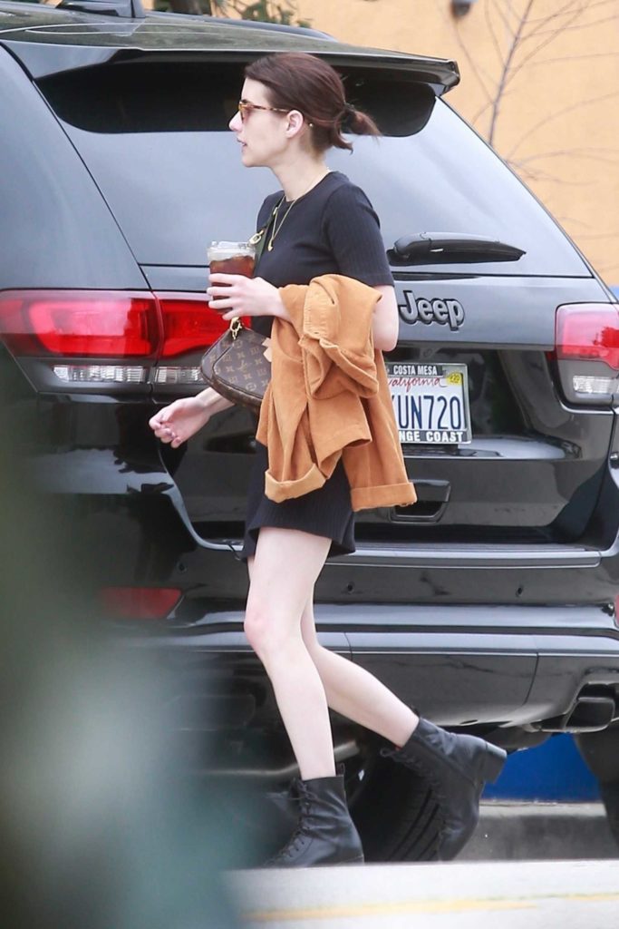 Emma Roberts in a Short Black Dress