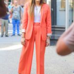 Carly Chaikin in a Red Suit Arrives at AOL Build Series in New York City