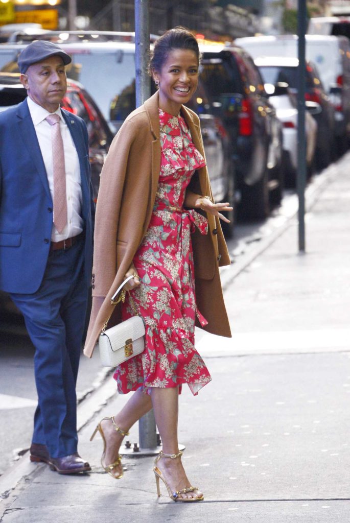 Gugu Mbatha-Raw in a Red Floral Dress