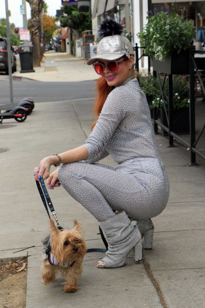 Phoebe Price in a Silver Suit