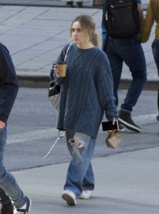 Sabrina Carpenter in a Gray Baggy Clothes on the Set of the Clouds in