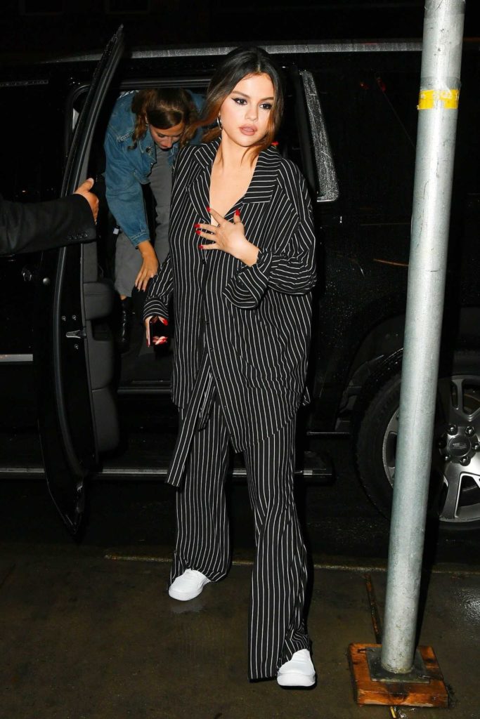 Selena Gomez in a Black Striped