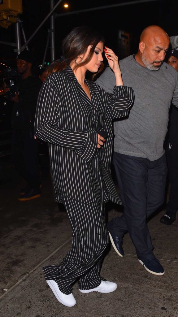 Selena Gomez in a Black Striped
