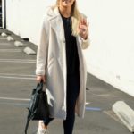 Witney Carson in a White Coat Arrives at the Dancing With The Stars Studio in Los Angeles