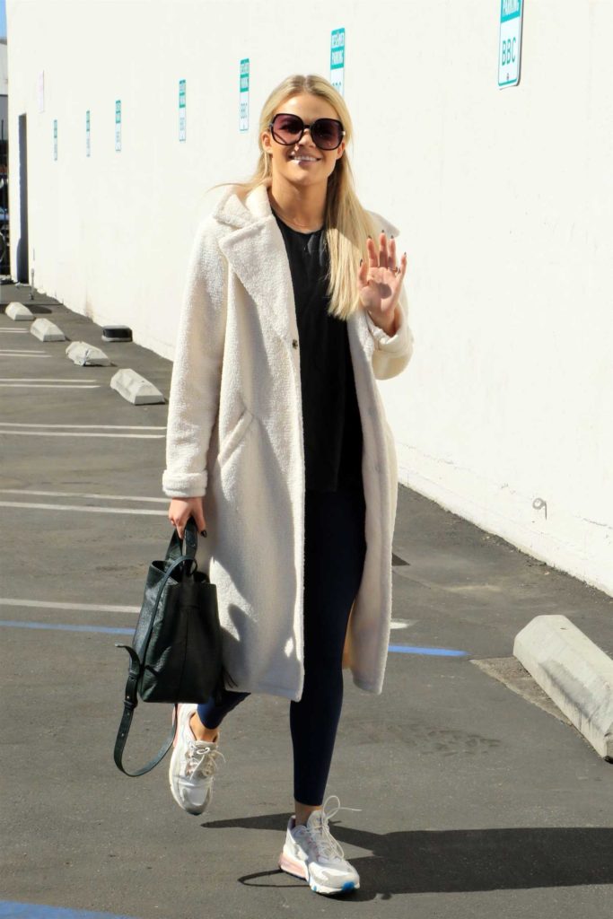 Witney Carson in a White Coat