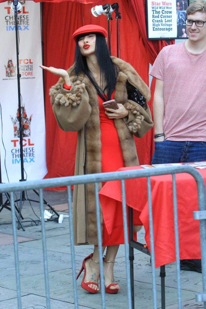 Bai Ling in a Beige Coat